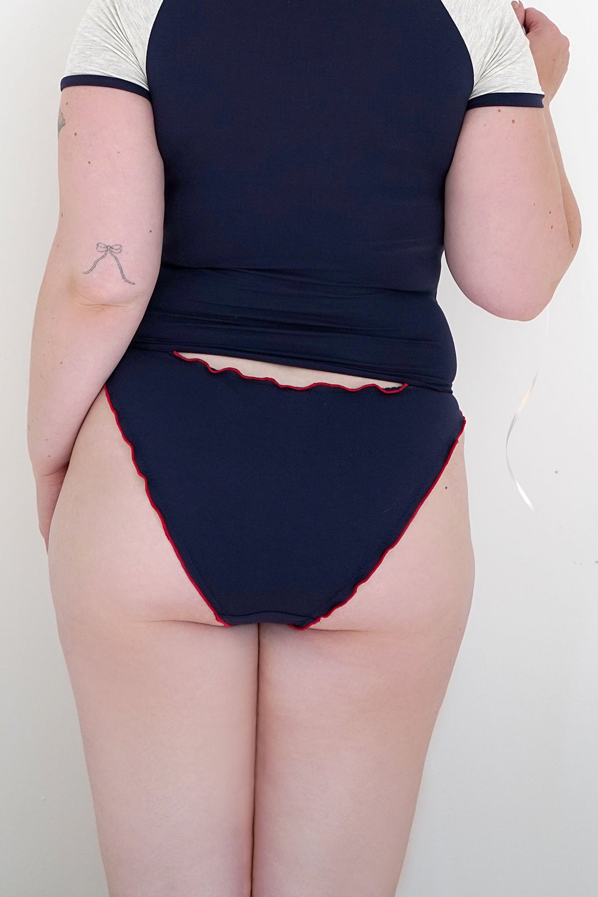 Navy underwear on the larger model — Size: XS, S, M, L