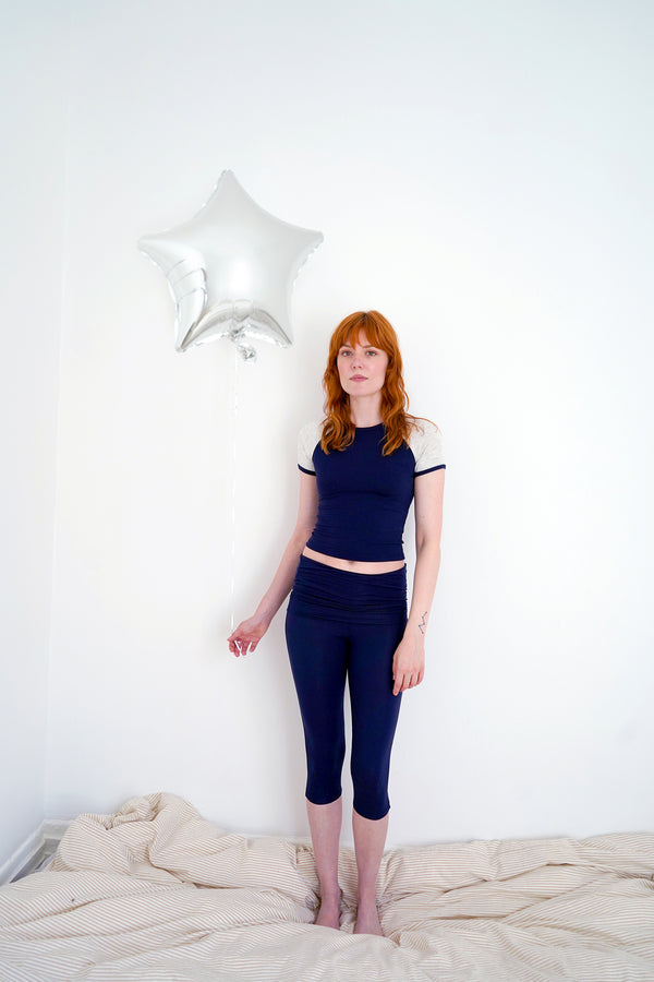 Navy set on the smaller model — Size: XS, S, M, L