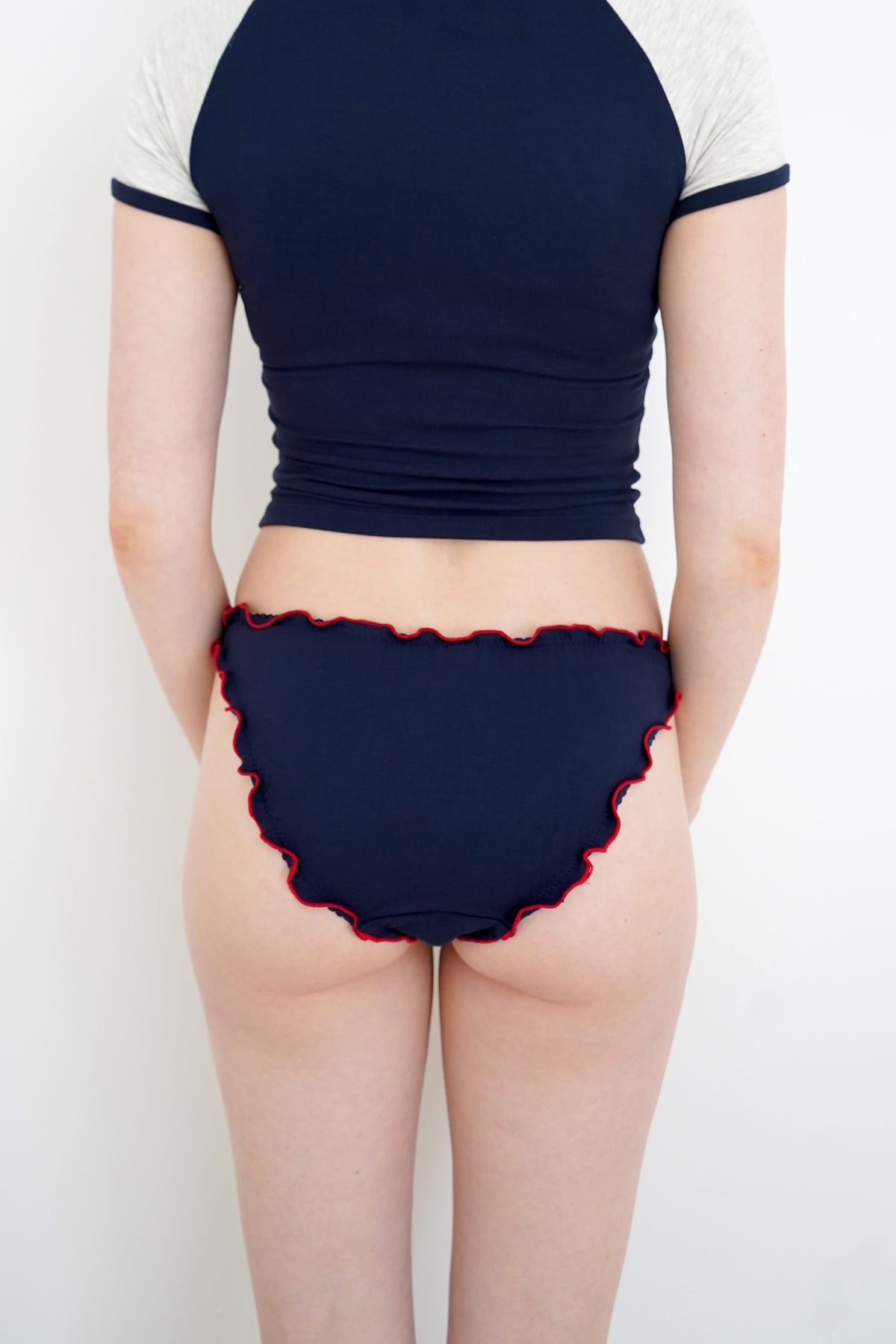 Navy underwear on the smaller model — Size: XS, S, M