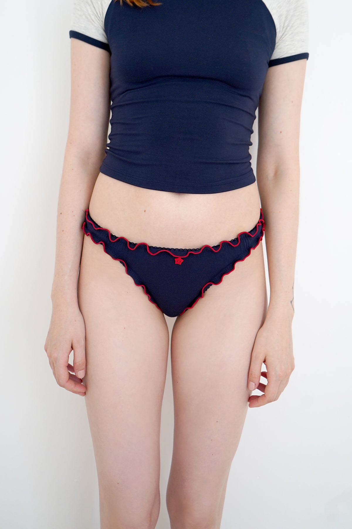 Navy underwear on the smaller model — Size: XS, S, M